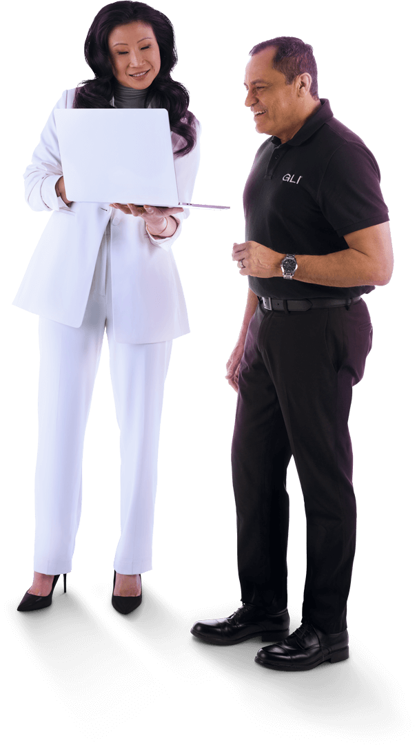 Two co-workers, woman in white suit and man in black business casual, analyze a new gaming software submission.