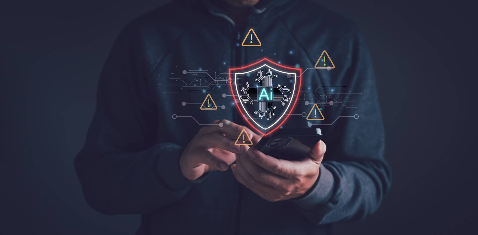 A person using a smartphone with a digital shield displaying "AI" and warning icons, representing cybersecurity, risk monitoring, and artificial intelligence (AI) protection in digital gaming.